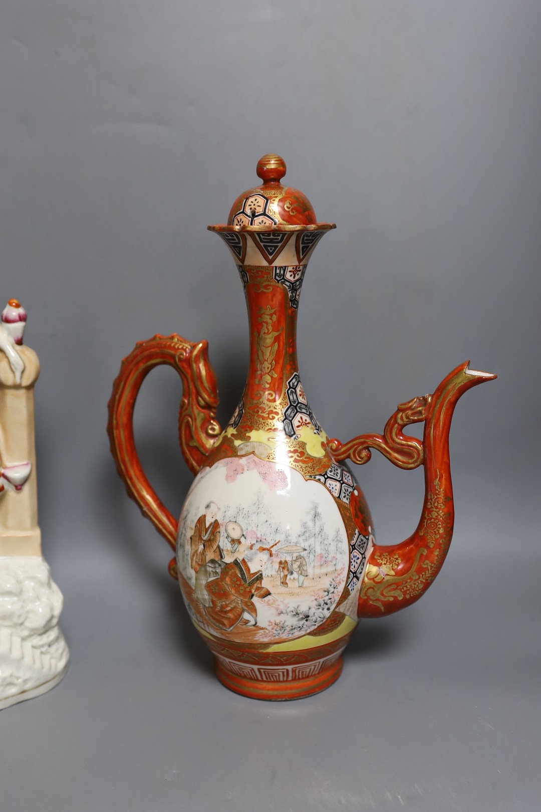 A Victorian Staffordshire flatback group, a pair of Staffordshire figures, an inkwell and a Japanese kutani coffee pot 32cm